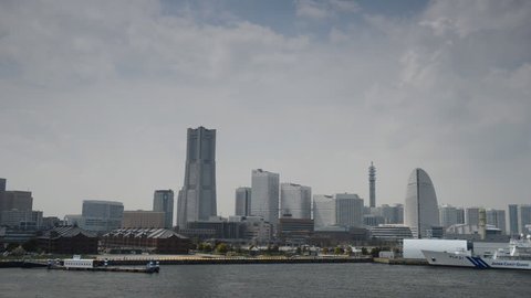 YOKOHAMA, JAPAN - APRIL 12, 2012 Establishing Shot Yokohama Skyline Office Building Business Skyscraper Japan Day