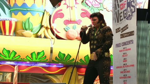 LAS VEGAS, NV - APRIL 22: Open air Elvis concert on Fremont Street on April 22, 2014 in Las Vegas, Nevada.