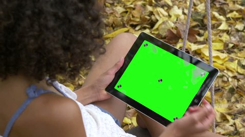 Young Girl with Tablet, Green Screen, Medium Shot