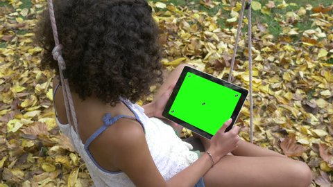 Young Girl with Tablet, Green Screen, Wide Shot