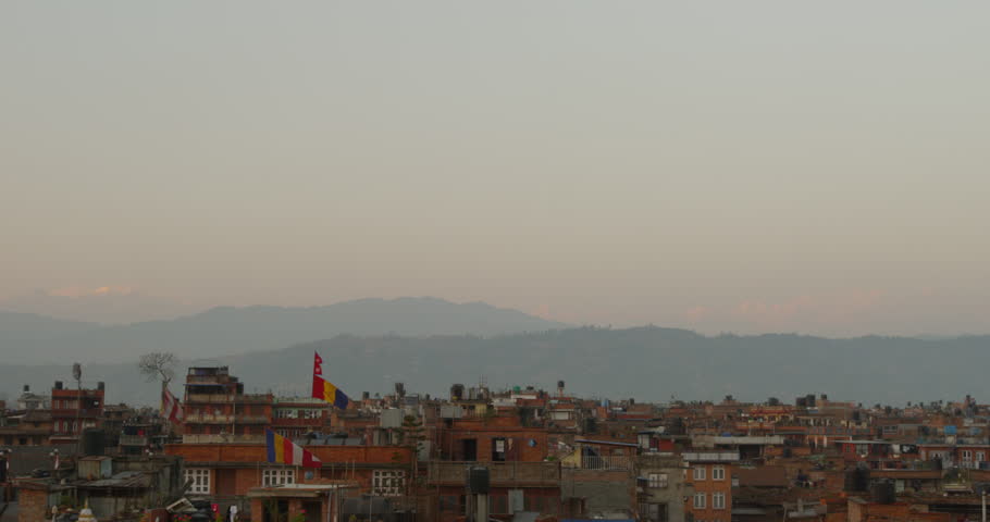 Sunset at Nyatapola Temple and Bhairavnath temple in Bhaktapur, Nepal. The Himalayan Mountain Range can be seen in the distance. Shot on Red Scarlet.