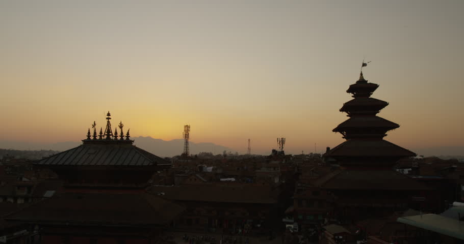 Sunset at Nyatapola Temple and Bhairavnath temple in Bhaktapur, Nepal. The Himalayan Mountain Range can be seen in the distance. Shot on Red Scarlet.