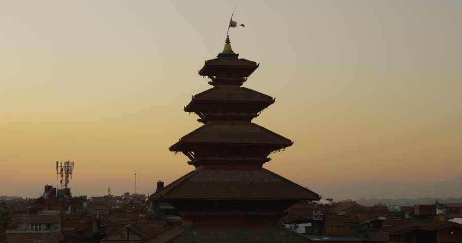 Sunset at Nyatapola Temple and Bhairavnath temple in Bhaktapur, Nepal. The Himalayan Mountain Range can be seen in the distance. Shot on Red Scarlet.