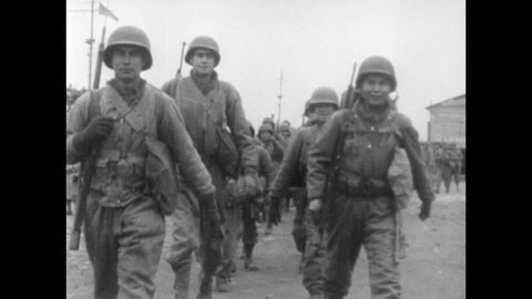 Soldiers of the US 36th Infantry Division walk towards Velletri to take part in Operation Diadem during the Italian Campaign of World War II, circa May 1944