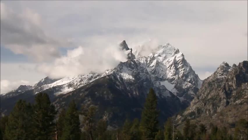 Grand Tetons (pan). A right to left pan of the Grand Tetons and fields from beyond the Cathedral group to past Mount Moran.