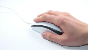 Female Hand Using a Computer Mouse on white background. 4K Ultra HD 3840x2160 Video Clip