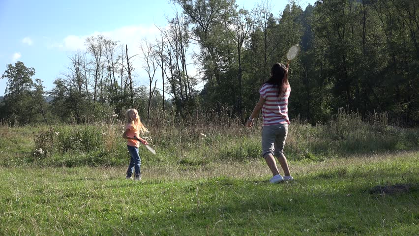 4K Father and Child, Little Girl Playing Badminton on Meadow, Happy Family Making Sport in Nature, People at Camping in Summer Vacation | Shutterstock HD Video #8711185