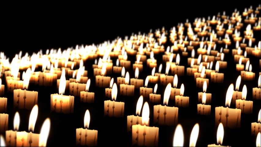 Thousands of candles in the night, close up, dof