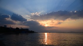 Sunset light shine with cloud at sea, Sriracha, Chonburi, Thailand (Blur background)