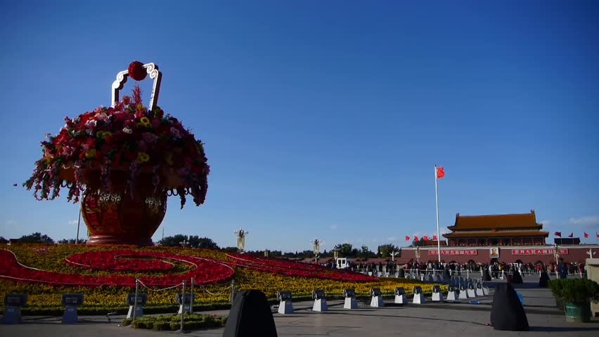 gorgeous baskets full of flowers in blue sky.Beijing Tiananmen Square sunny. gh2_04261