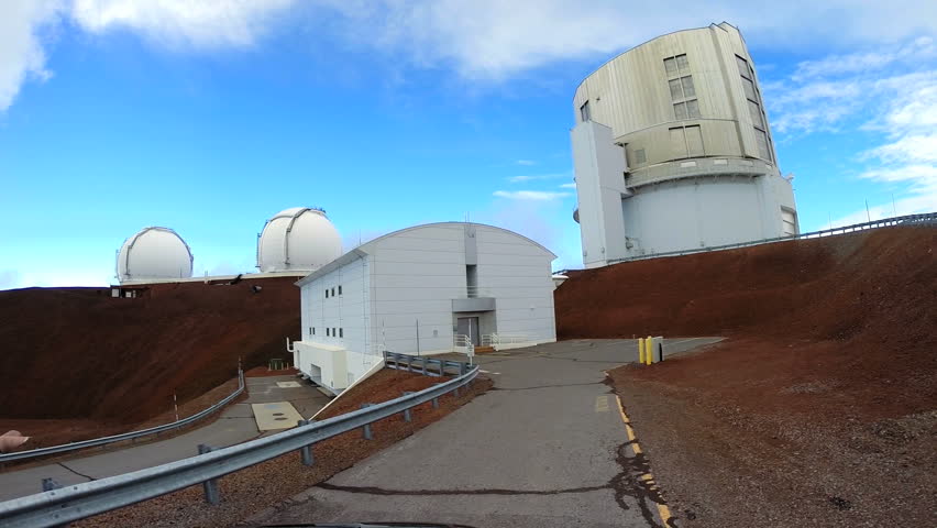 POV driving elevated position Mauna Kea observatory buildings geographical surveillance planets electromagnetic data telescope future antenna
