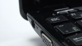 Close-up View of Woman Insert Laptop Battery Charge. 4K Ultra HD 3840x2160 Video Clip
