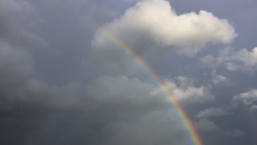 rainbow in sky, time-lapse
