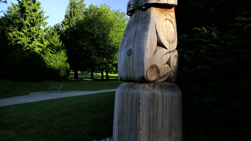 Totem Pole North American tribal culture handcrafted freestanding carvings statue Stanley Park Vancouver British Columbia Canada