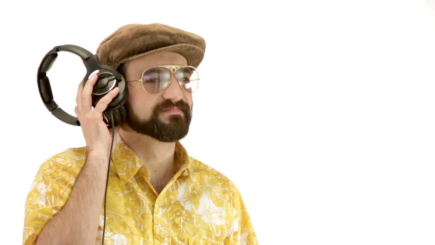 Young man dressing 70s yellow-orange vintage clothes and hat talking into the microphone close-up - isolated-on-white HD video footage