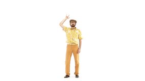 Young man dressing 70s yellow-orange vintage clothes and hat makes dance move on 103 bpm music track - isolated-on-white HD video footage
