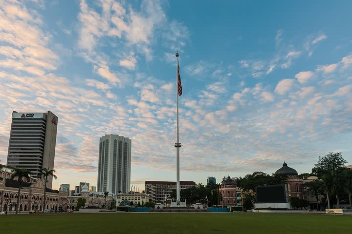 Merdeka Square, Kuala Lumpur, Malaysia Sunrise Time Lapse with the Malaysia Flag Dancing