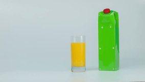 pack shot, pack of orange juice, orange juice in a glass, template for video advertising juice