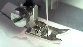Close-up View of Working Sewing Machine. 4K Ultra HD 3840x2160 Video Clip