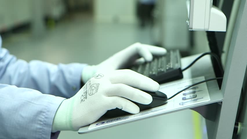 An Engineer controls the process. Techonology of Electronic Board Factory