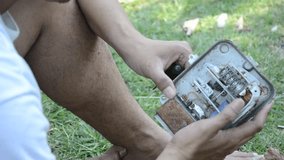 A man check an  electricity meter for repair,video,footage,clip