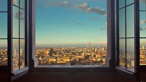 bologna cityscape as seen from behind a window day to night timelapse at the sunset to night city lighting up panorama 4k