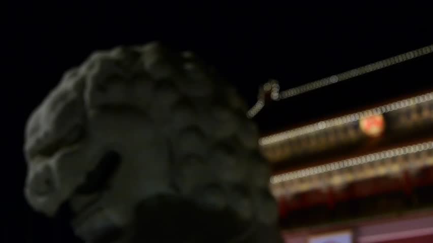 OCTOBER 15, 2013:ancient bronze lion in front of forbidden City at night,China Political center. gh2_05583