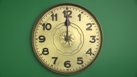Time-lapse of clock's dialplate with arabic digits, full round 12 hours lendth, frame per 30 seconds, green screen
