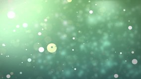 Moving gloss particles on green background loop. Soft beautiful backgrounds. Circular shapes perform dance. motion background. More sets footage  in my portfolio.
