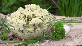 Homemade Herb Butter (rotating; seamless loopable 4K UHD footage)
