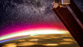 International Space Station ISS  Near Aurora Borealis With Startrails, Time Lapse 4K.
Created from Public Domain images, courtesy of NASA Johnson Space Center :
http://eol.jsc.nasa.gov
