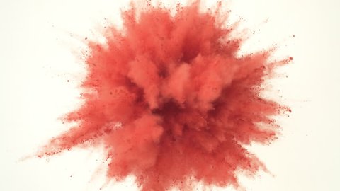 Colorful powder/particles fly after being exploded against white background. Shot with high speed camera, phantom flex 4K. Slow Motion. Unedited version is included at the end of clip.