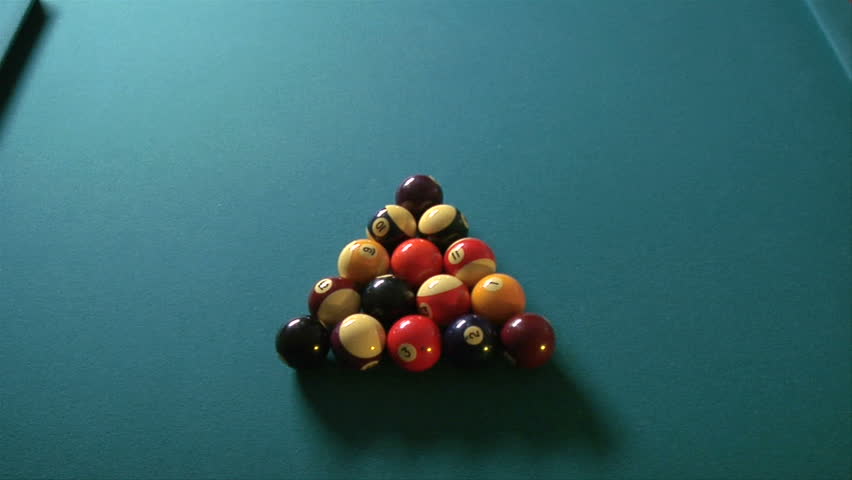 This is an overhead shot of billiards balls breaking.  This was shot with a