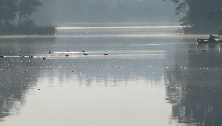 Fisherman on a lake