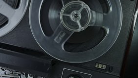 [ungraded] Reel-to-reel tape recorder. Spinning reels with counter. Source: Canon 7D, ungraded. H.264 from camera without re-encoding. Clip ID: ax483u