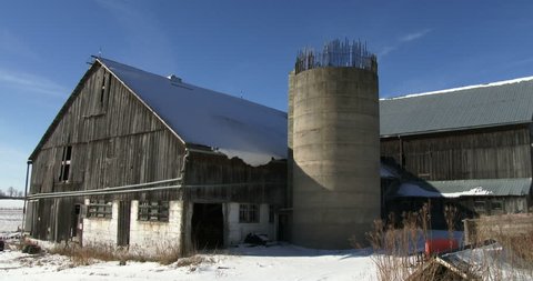 Old barn in organic farm in winter in Canada
