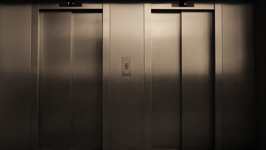 Modern aluminum case elevator door opens and closes shortly after / HD1280 /
