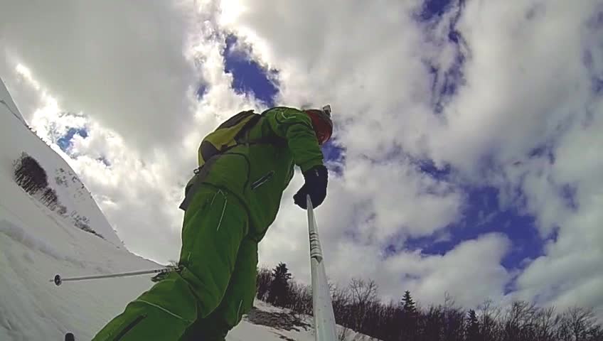 Ski sport man downhill at winter