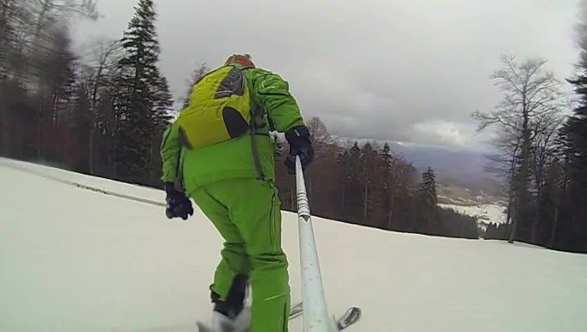 Ski sport man downhill at winter