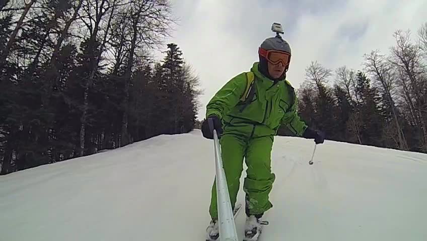 Ski sport man downhill at winter