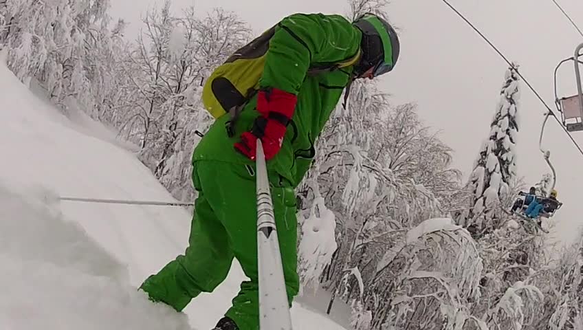 Ski sport man downhill at winter