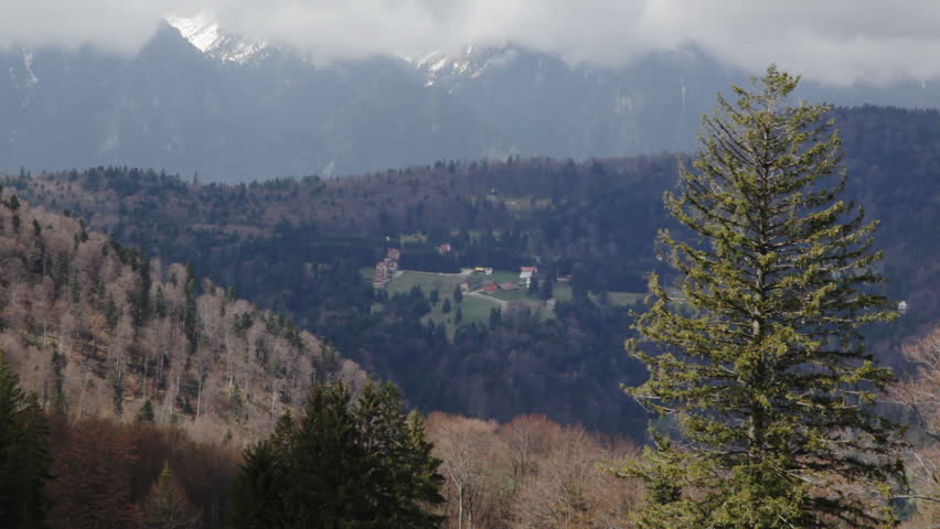 Mountain resort zoom out to green landscape