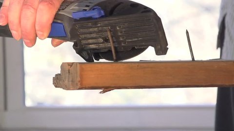  Hand saw cutting off nail slow motion 2