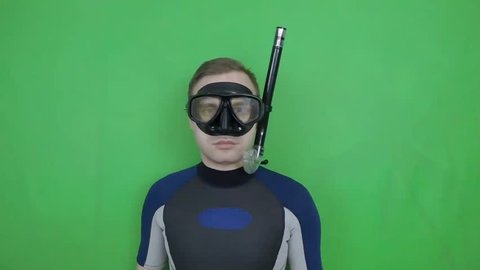 Diving sign,divemaster shows sign HOVER basic skill from diving course open water diver   16 of 18 also  available all diving sign on green screen (with full equipment)
