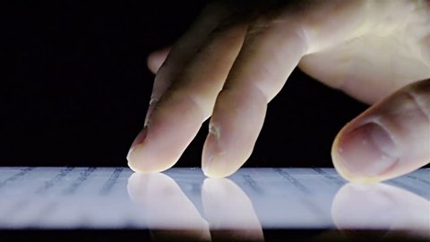 Close-Up Tablet Touchscreen On Black Background