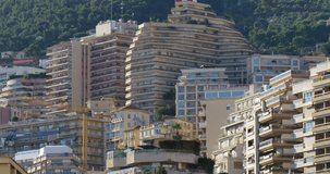 Monte Carlo, Monaco city buildings architecture, luxury skyscrapers houses at french riviera, south France, Europe. Cityscape of famous yachts port principality and town, close up details of streets