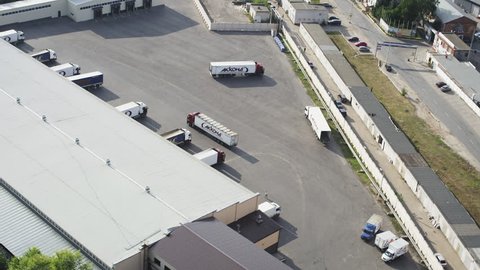 Aerial shot trucks at loading