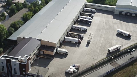 Aerial shot trucks at loading