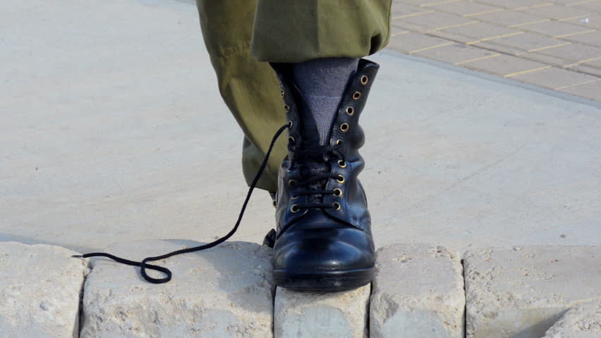 tying boots military style