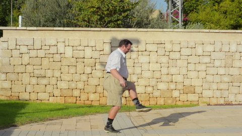 How to jump rope for the first time. Fat man 50 years old tries it out